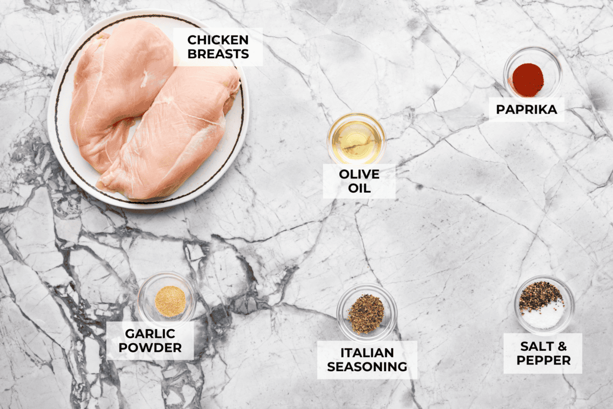 With this Air Fyer Chicken recipe, I am going to show you how to make the most insanely tender and juicy chicken! The secret? The incredible seasonings! They create a nice golden, crispy outside with a juicy, flavor-packed inside! Overhead shot of labeled ingredients.