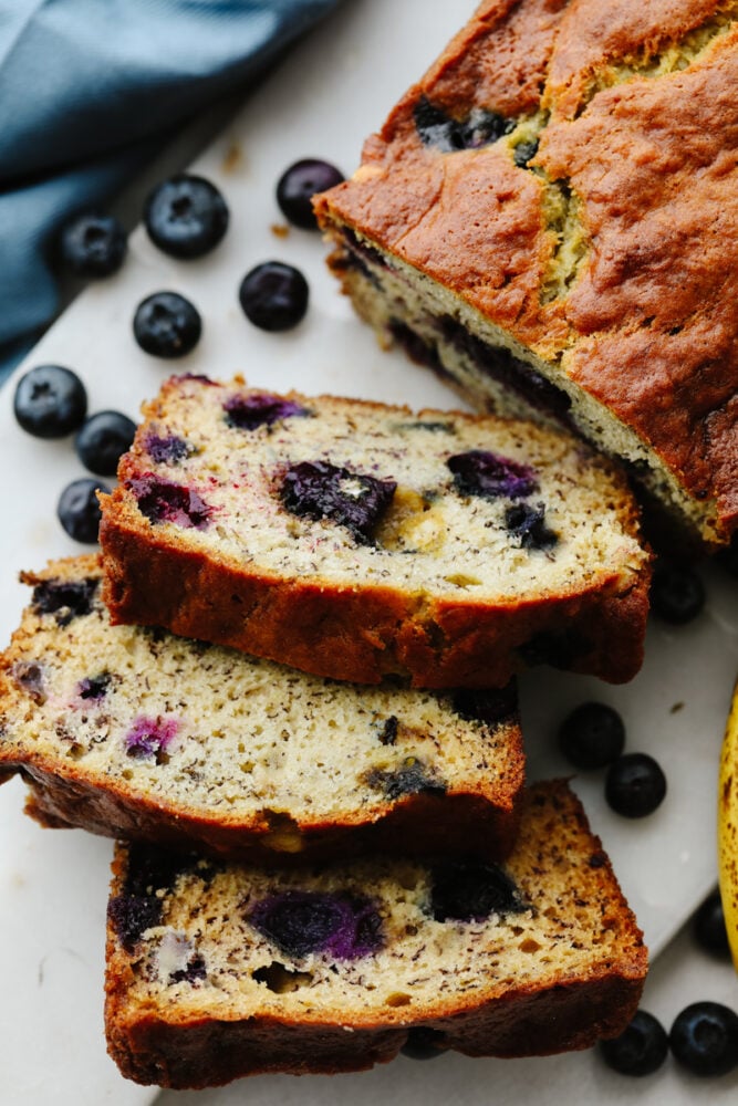 3 slices cut from a loaf of banana bread.